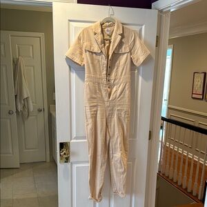 Cream colored jumpsuit from urban outfitters